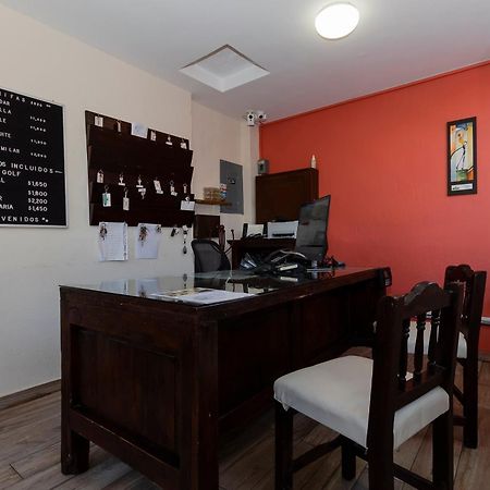 Capital O La Huerta Golf & Hotel Чолула Экстерьер фото