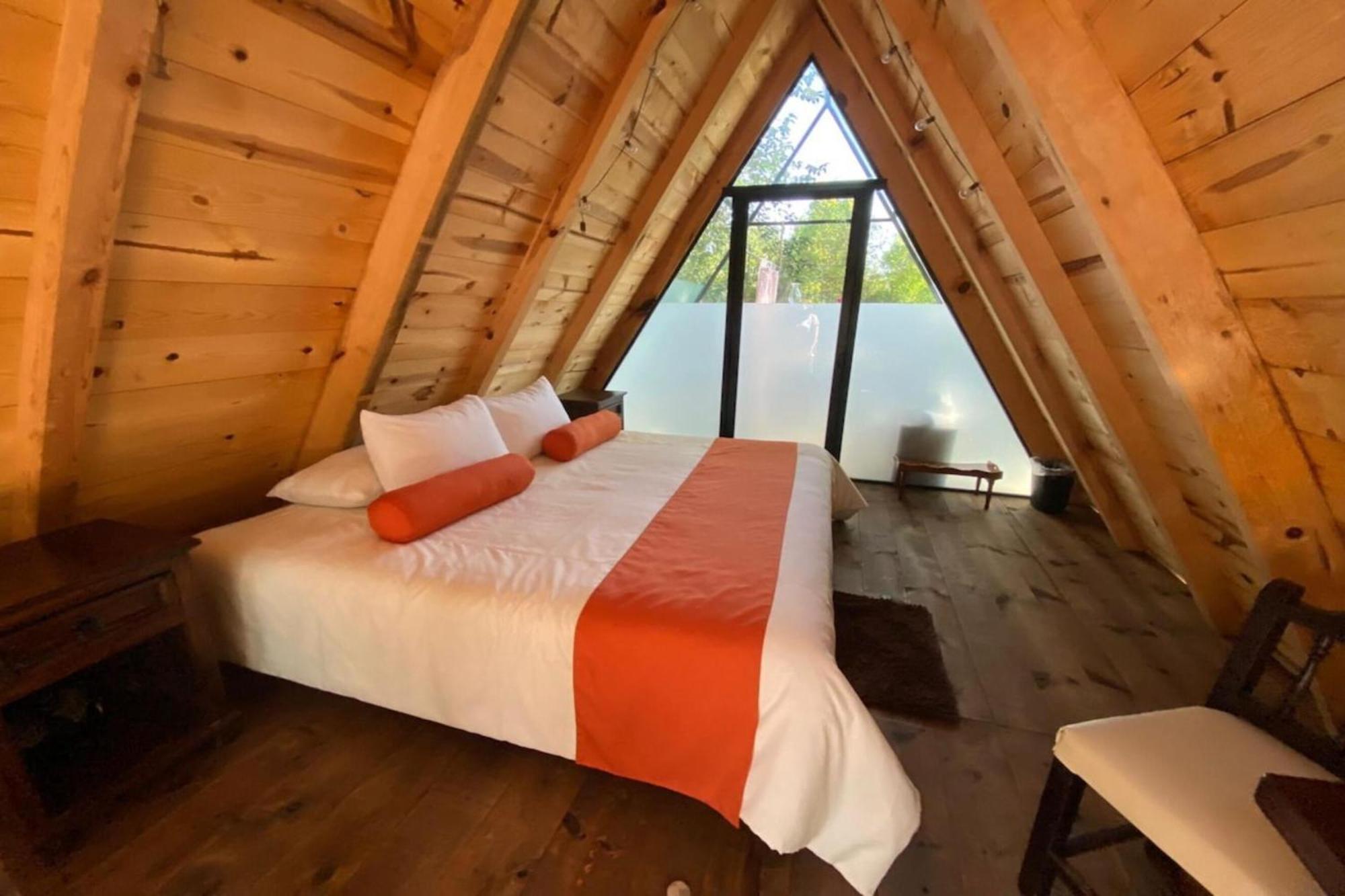 Capital O La Huerta Golf & Hotel Чолула Экстерьер фото